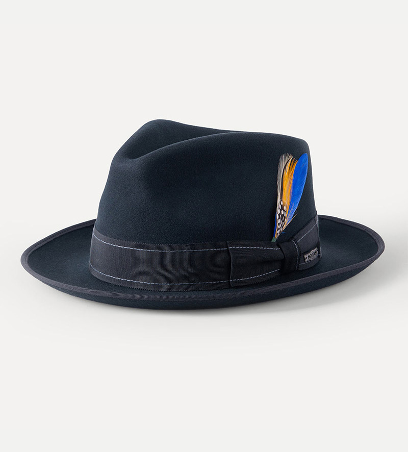 oblique view of black classic fedora hat with feather