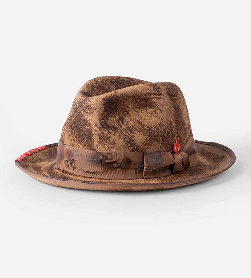 oblique view of distressed fedora hat