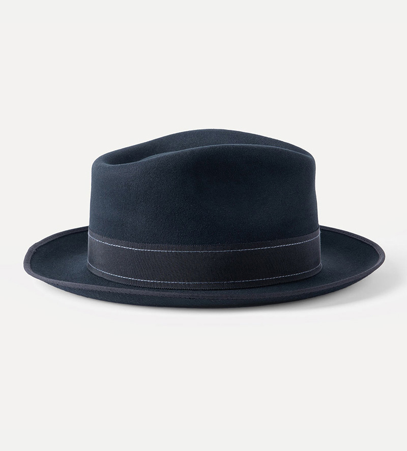 side view of black classic fedora hat with feather