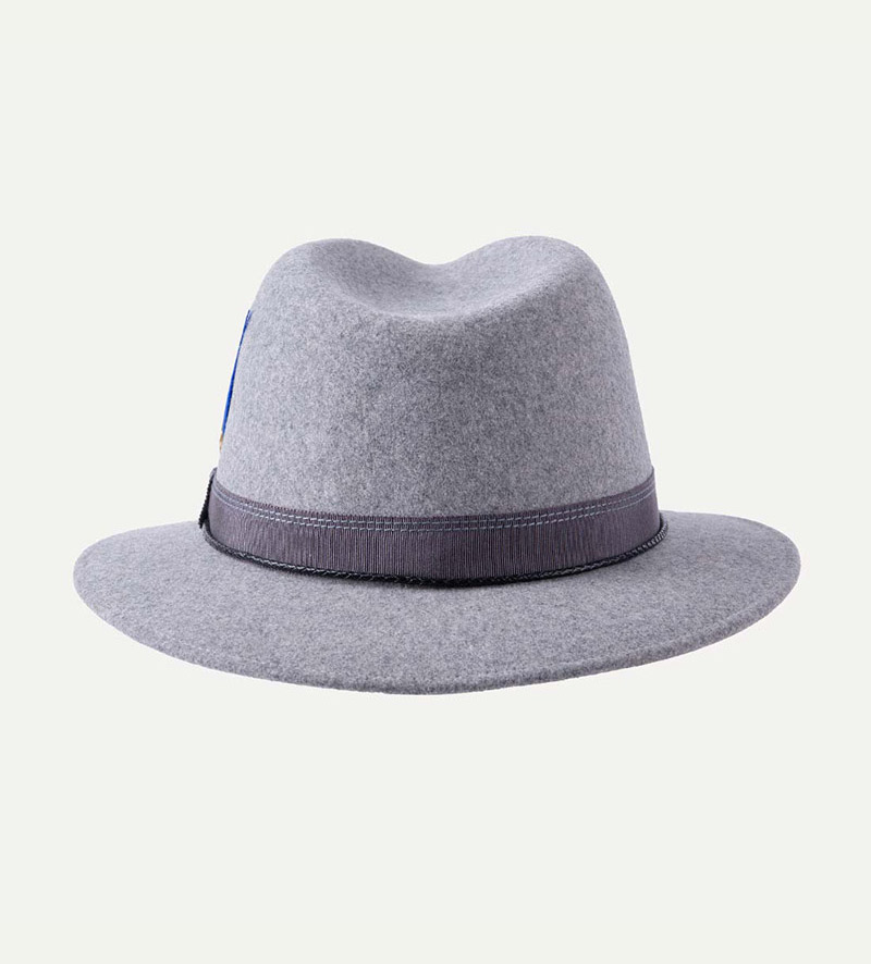 back view of grey fedora hat with feather