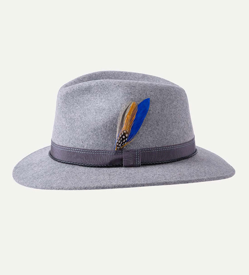 side view of grey fedora hat with feather