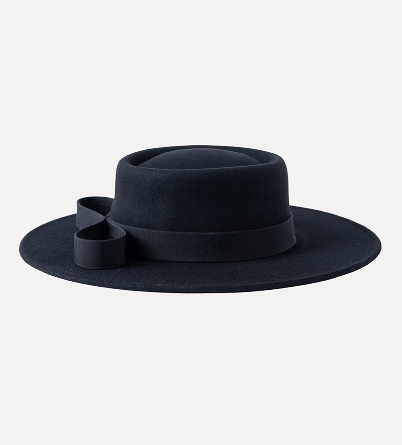 side view of black wide brim pork pie hat