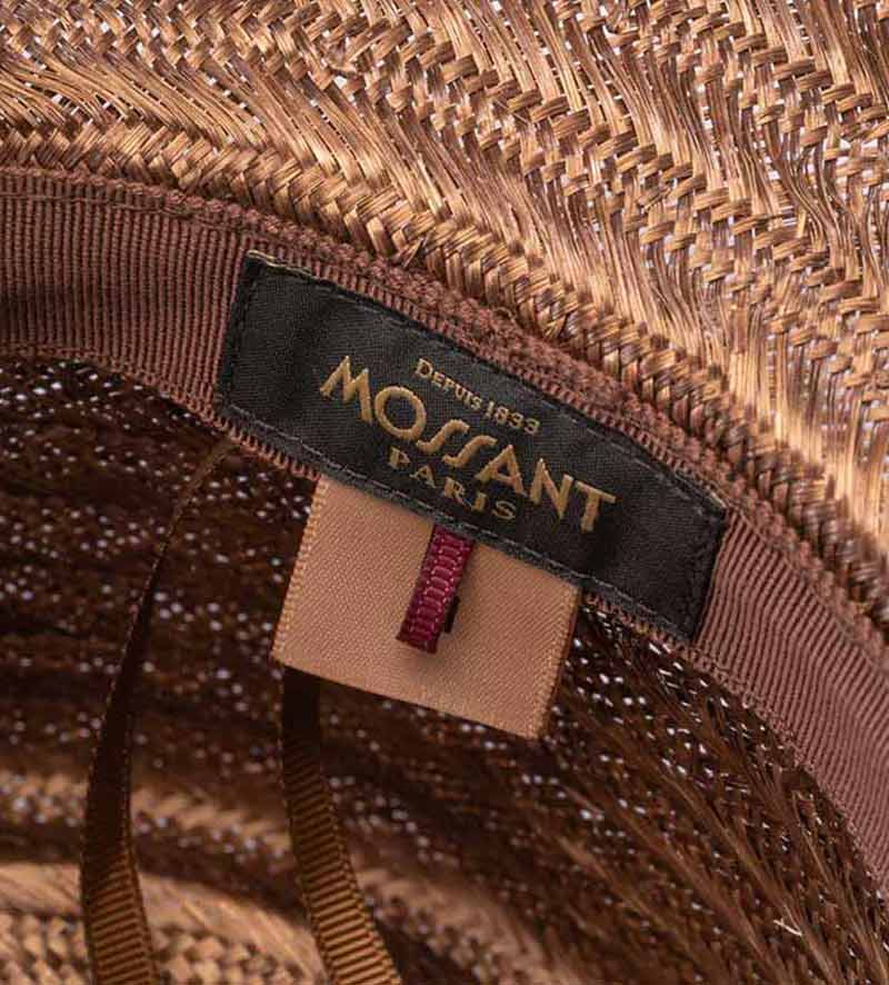 hatband view of large brim straw hat