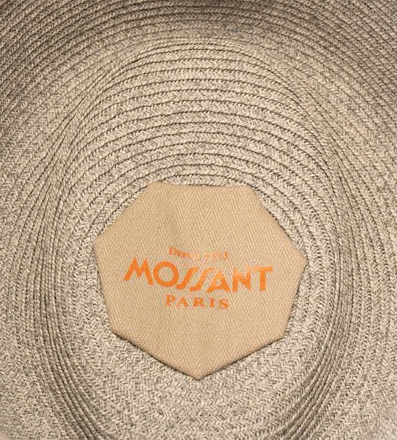 detail of packable straw trilby hat
