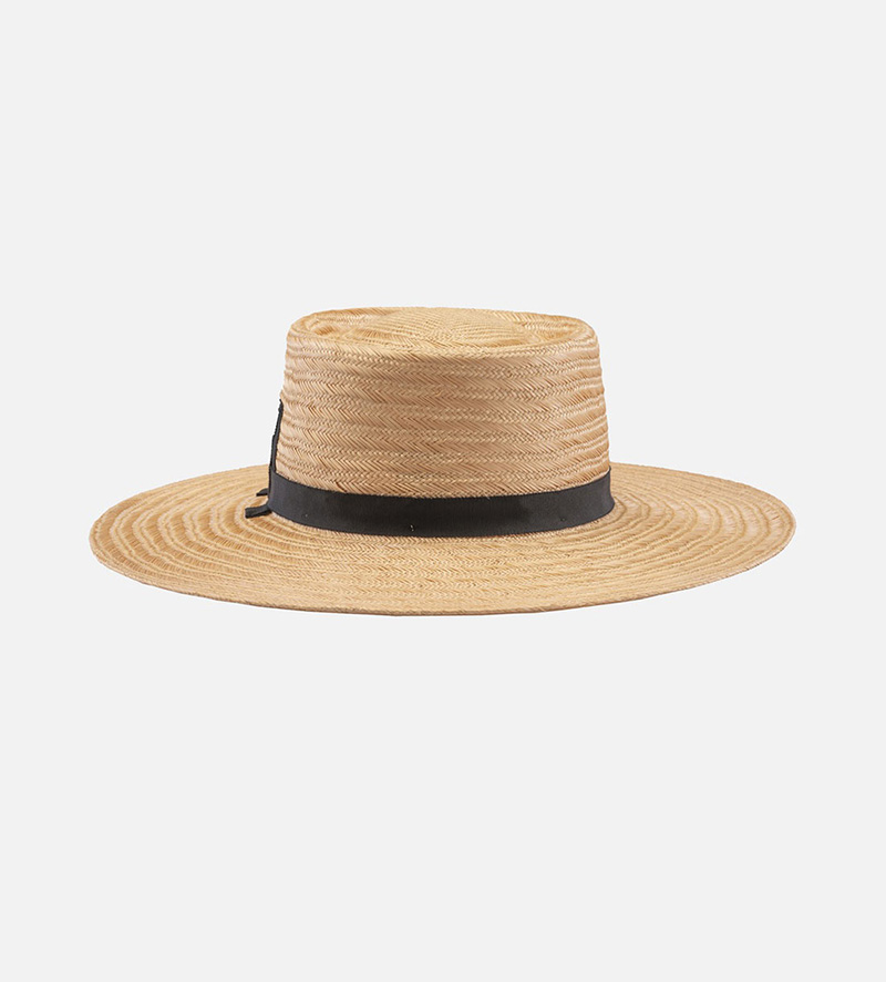 side view of womens wide brim straw hat