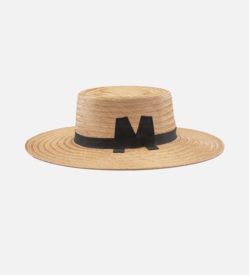 side view of womens wide brim straw hat