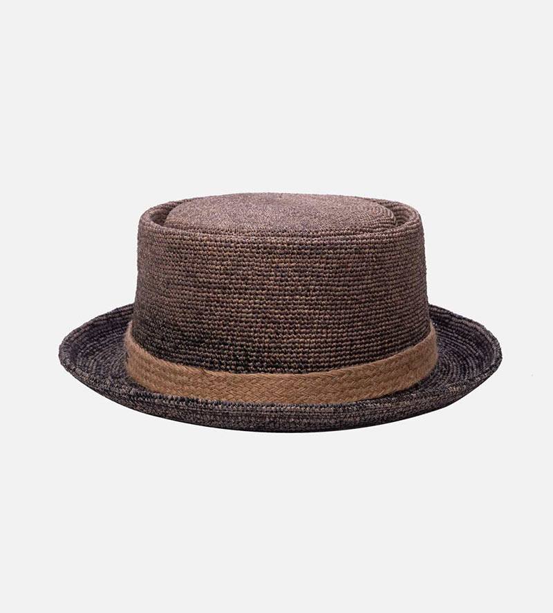 oblique view of straw pork pie hat