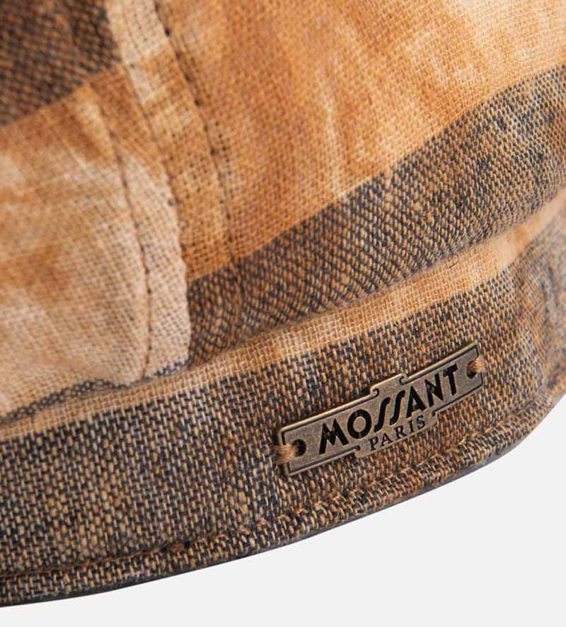 detail of plaid newsboy cap
