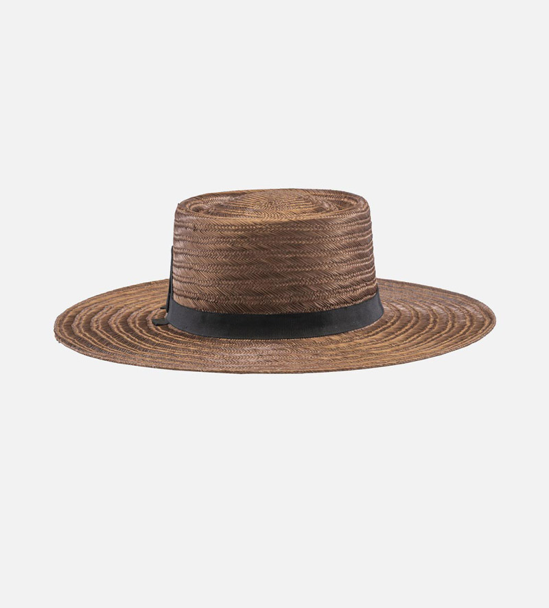 side view of large brim straw hat
