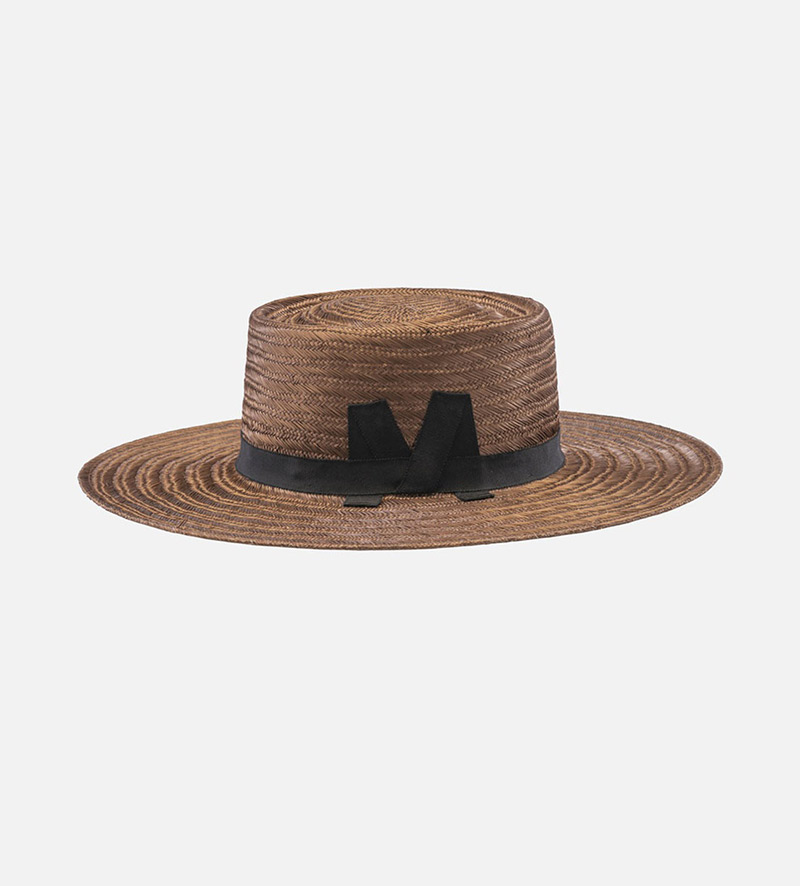 side view of large brim straw hat