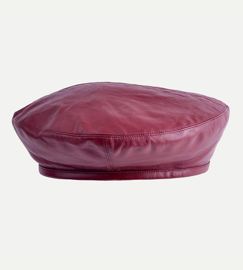 side view of womens maroon beret