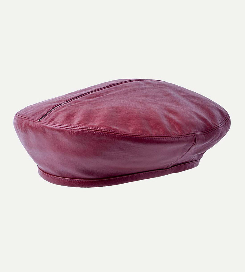 oblique view of womens maroon beret