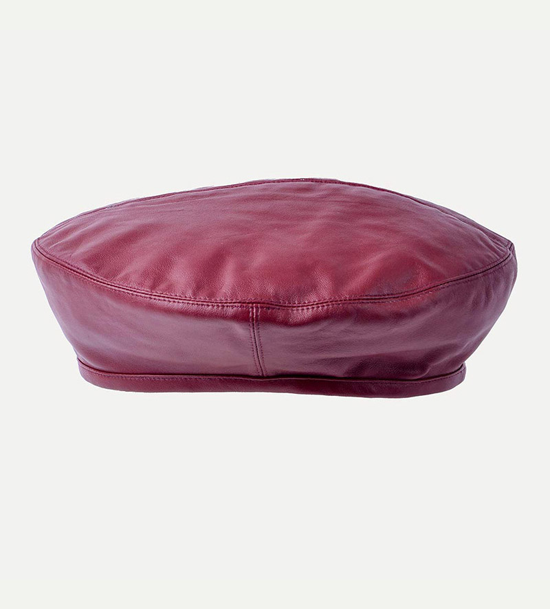 side view of womens maroon beret