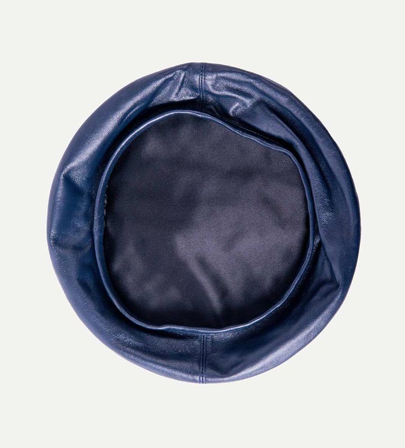 inside view of womens blue leather beret