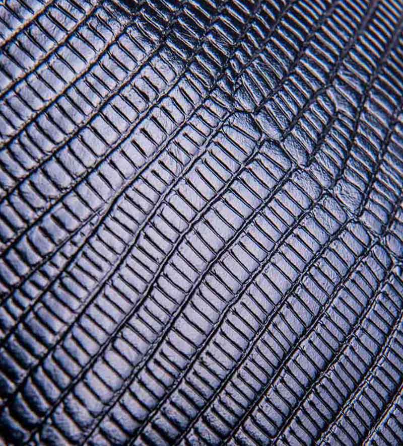 detail of womens black leather beret