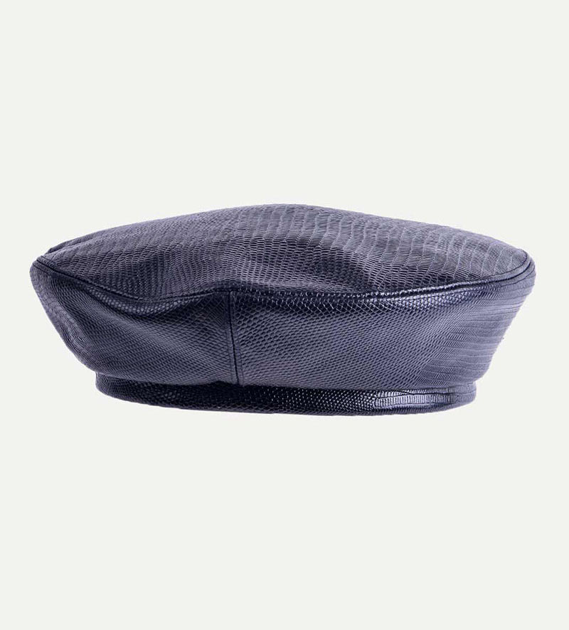 side view of womens black leather beret