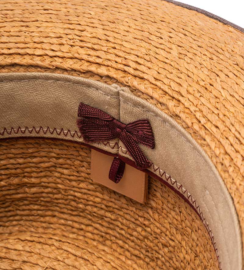 detail of straw fedora hat